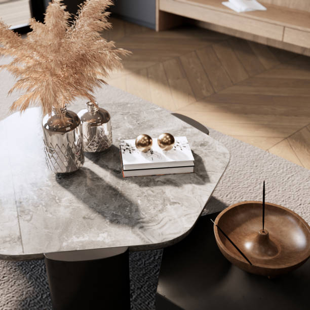 istock 3d rendering. Close up design coffee table on grey carpet wooden parquet floor top view interior room decoration. 1470867502