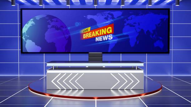 istock white table and led screen background in the news studio room.3d rendering. 1470869806