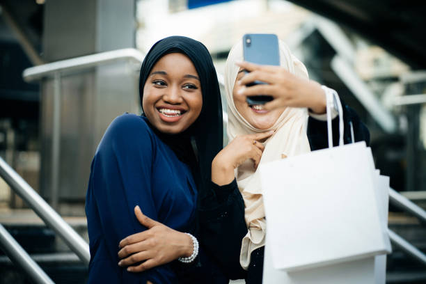 istock Two friends muslim are taking a selfie 1470873596