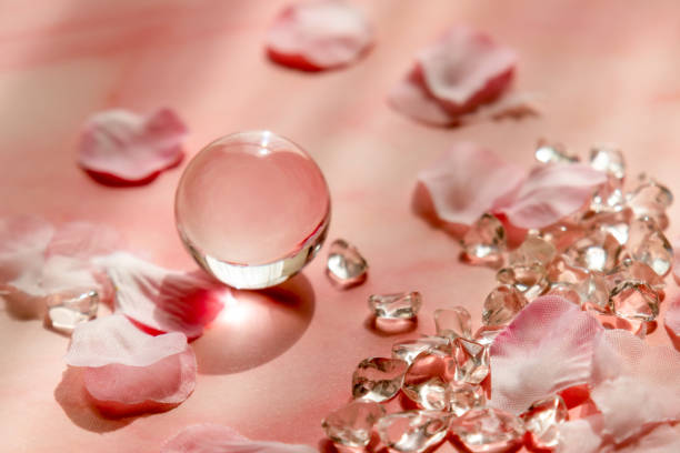 istock crystal ball and cherry blossom petals on pink background 1470873709