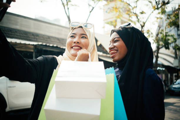 istock Two friends muslim are taking a selfie 1470874808
