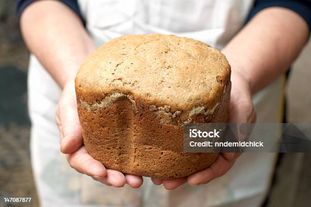 Hands Of Woman Baker With Homemade Bread Stock Photo - Download Image Now - Adult, Baked Pastry Item, Baker - Occupation