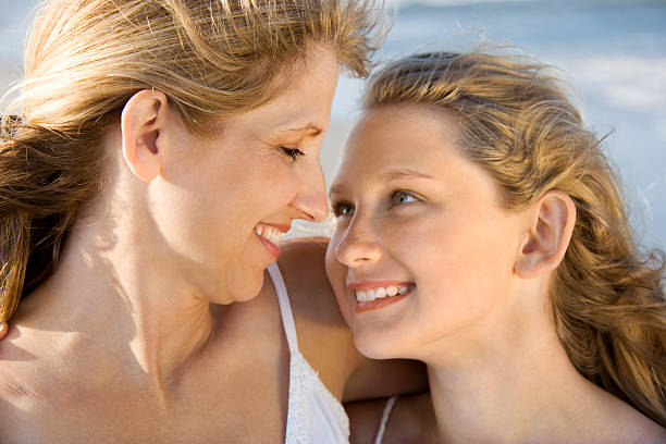 istock Mother and Daughter at the Beach 147088017