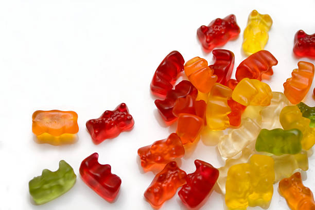 Gummi bears Lot of colorfoul gummi bears on white gummi bears photos stock pictures, royalty-free photos & images