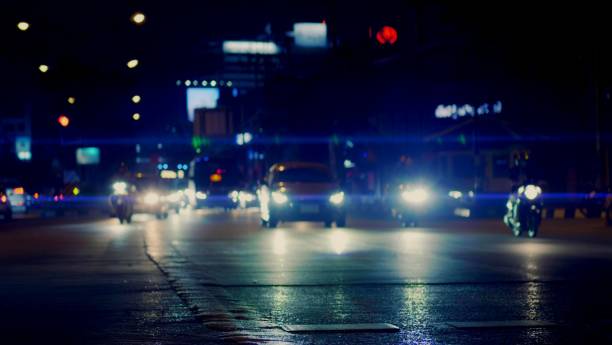 istock lens flare image anamorphic lens  on road midnight Thailand 1470882422