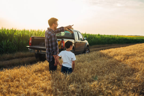 istock father and son outdoor on field 1470882684