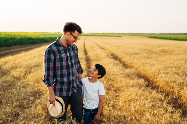 istock father and son outdoor on field 1470882686