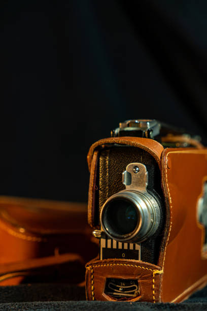 istock Vintage film camera with black background 1470882728