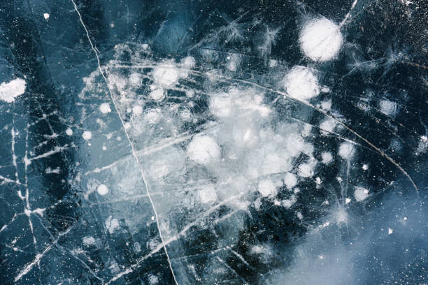 istock Natural ice bubbles on frozen lake in wintertime 1470883608