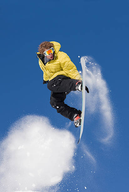 istock Extreme Snowboard Jump Against Brilliant Sky 147088383