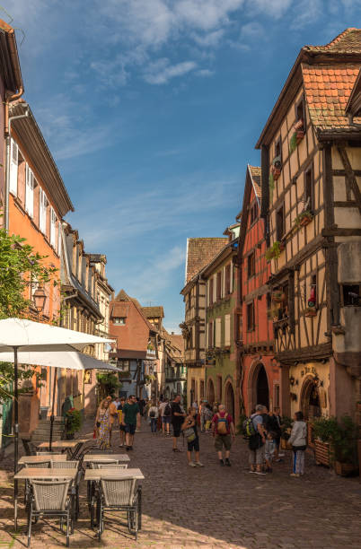 Pedestrian street in the historic center of the Alsatian commune of Riquewihr stock photo