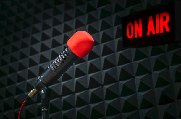 istock Professional microphone and on air sign 1470886631