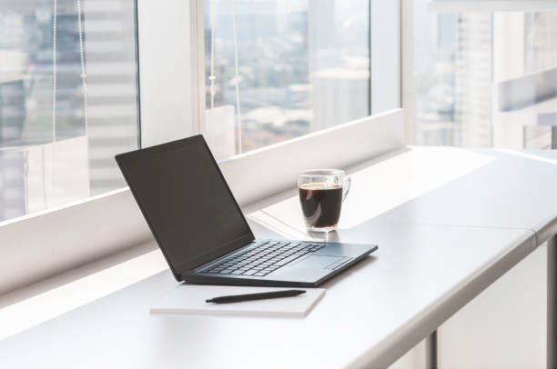 istock Single black laptop notepad pen and mobile phone online connected via sharing hotspot ready for meeting and run project, business conception brain strom and get idea for customer. 1470887799