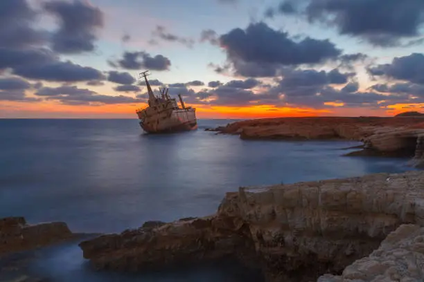Photo of Rocky seascape from the island of Cyprus with the shipwreck as main object