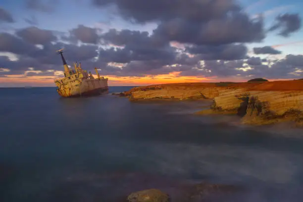 Photo of Rocky seascape from the island of Cyprus with the shipwreck as main object