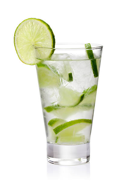 istock Ice cold lemonade with fresh lime slices isolated on white 147088804