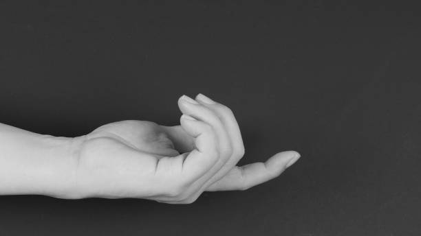 istock Index finger hand gesture on black background. Black and white picture 1470890831