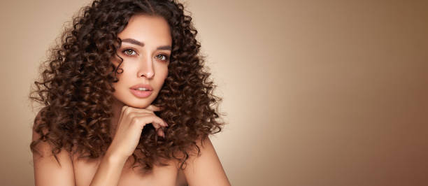 istock Beautiful smiling woman with afro curls 1470892386