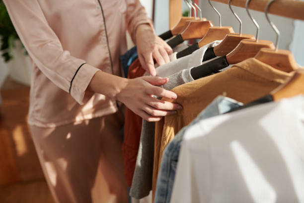 istock Young Woman Choosing Clothes 1470896671