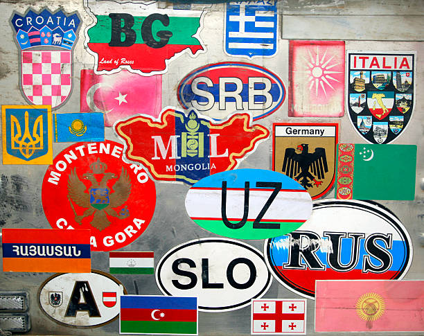 globetrotter Country abbreviations stickers on a metal suitcase travel sticker stock pictures, royalty-free photos & images