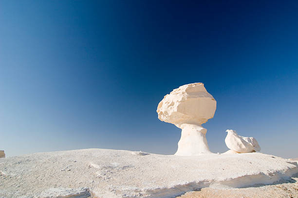 istock View of rocks in the White Desert against a blue sky 147089876