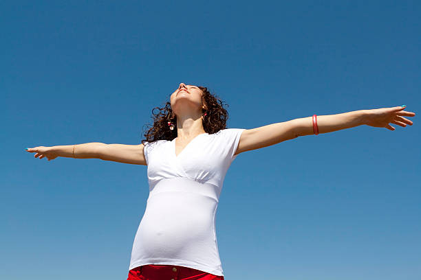 istock Pregnant woman and Sky 147090194