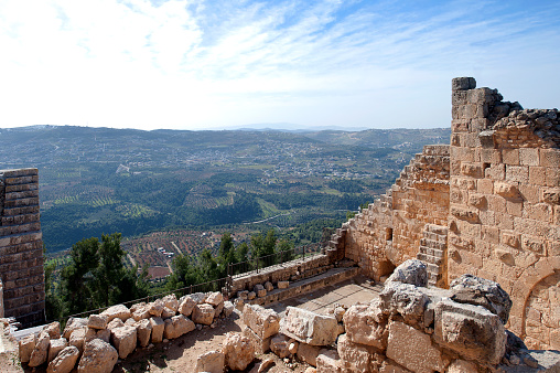 Ajlun, or Ajloun, is a medieval castle built by Saladin and designed to intimidate the Franks. Arab military fortifications were strengthened as the years went by and Saladin worked hard to unite the Muslim forces. An imposing stronghold with moat, drawbridge and towers, Ajlun was built in 1184 but lost much of its military significance after the fall of Karak, the crusader stronghold - However, the castle guarded important trade routes into Syria and never  fell into disuse. Ajlun featured heavily during the wars between the Mongols and the Mamluk empire, Occupied and severely damaged by the Mongol invaders before being reclaimed by the Mameluk Sultan Baibars. Under Ottomans rule Ajlun Castle continued in an administrative role until the 19th century, when it was abandoned after severe damage from earthquake