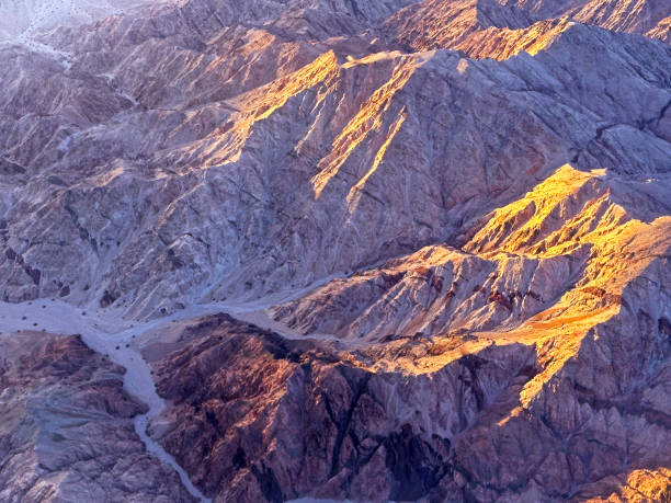 istock Sunrise shadows from mountainous aerial view, Jordan 1470909292