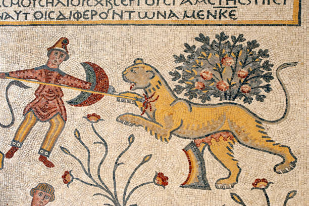 Mosaic of hunter and lion on floor, Mount Nebo,, Abarim mountains, Jordan stock photo