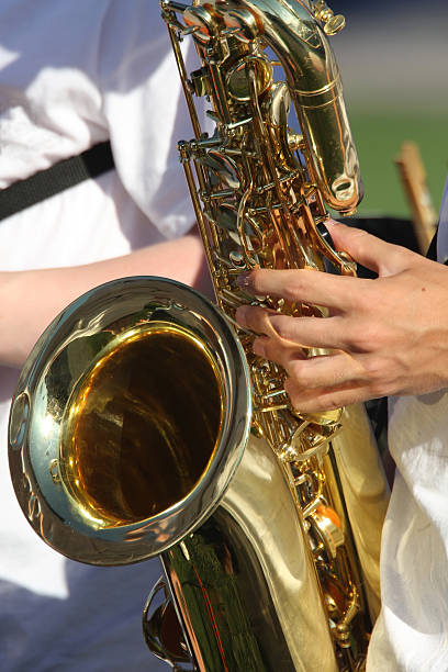 Musique de saxophone avec un membre - Photo