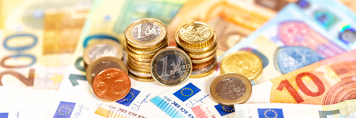 Euro coins banknotes bill saving money pay paying finances bank notes banknote panorama rich