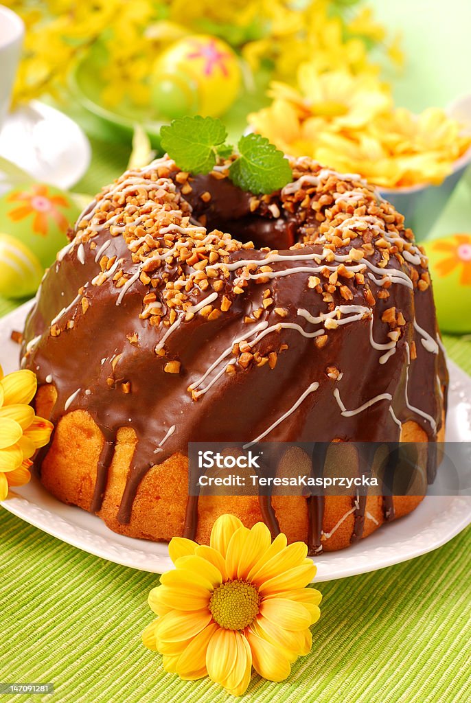 chocolate ring cake for easter chocolate ring cake with nut topping for easter Baked Stock Photo