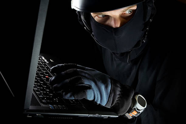 istock Identity theft, man and laptop at night 147091292