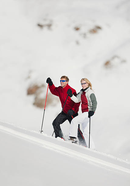 istock Young Couple Snowshoeing In Colorado 147091463