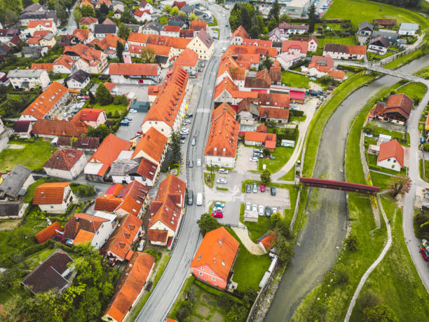 istock Old town in Europe with a river running trough 1470915186