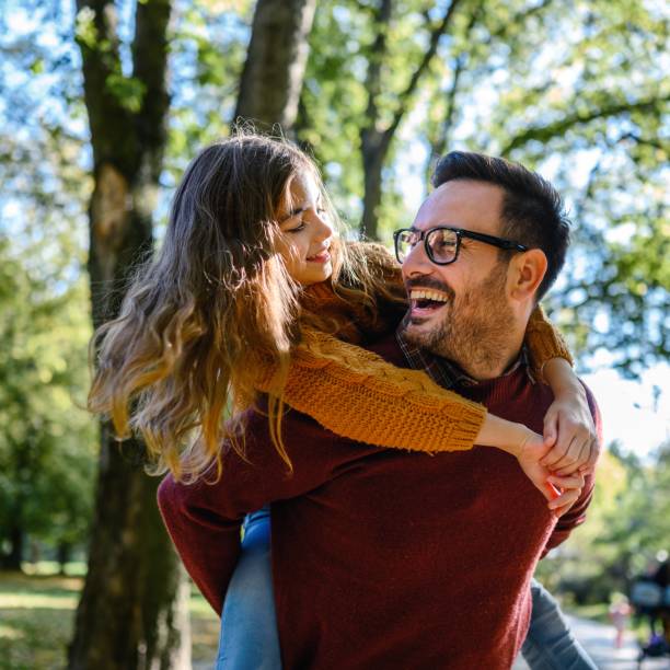 Happy father spending time with her daughter
