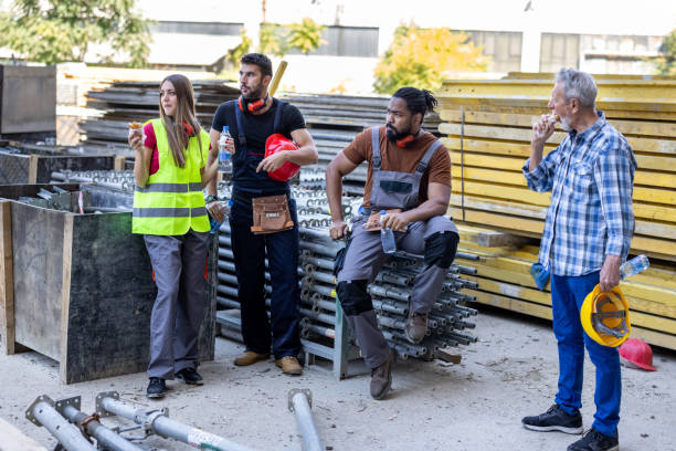 istock A Multi-Ethnic Group of Construction Workers is Taking a Break and Eating. 1470916055