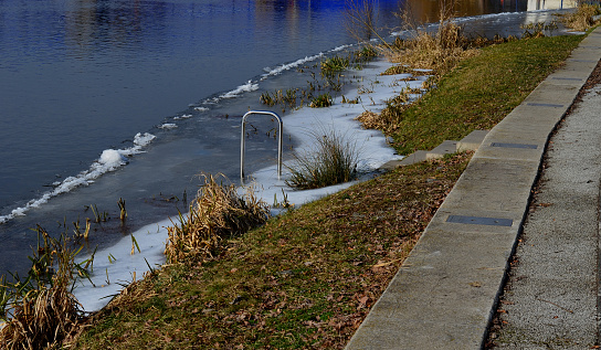 the frozen river has modified entrances to the water from the embankment. if the swimmer decides to take a bath as part of conditioning and hardening after the sauna, it is possible to use stainless, harden