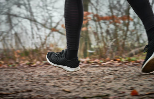 istock Feet on dirt road exercising 1470922917