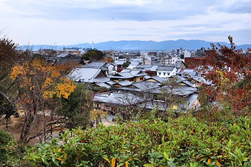 Kyoto city, Japan. Kyoto old town Higashiyama skyline. Grey tiled roof tops.
