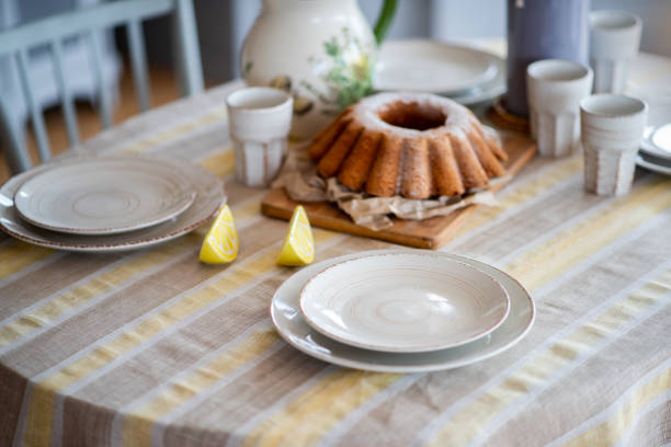 istock Easter lemon bundt cake, Babka sprinkled with powdered sugar on a festive table decorated 1470930656
