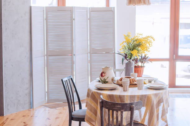 istock Spring, Easter interior in Scandinavian style. Rustic Living room with bright wardrobe yellow mimosa 1470930773