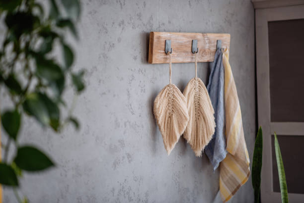 istock Macrame leaves hangs on a gray plain background. Handmade hobby. Decoration in Boho style. 1470930799