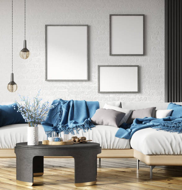 Interior design of modern living room with white sofa over the brick wall with mock up frames. Home interior with coffee table. 3d rendering