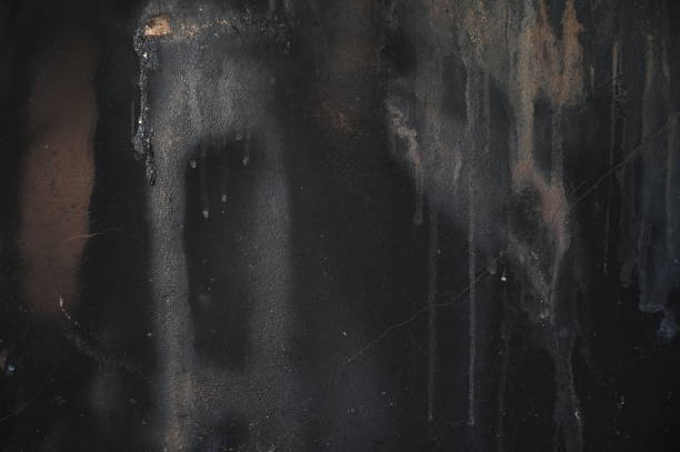 istock black dirty wall was burn from fire, construction industry 1470931041