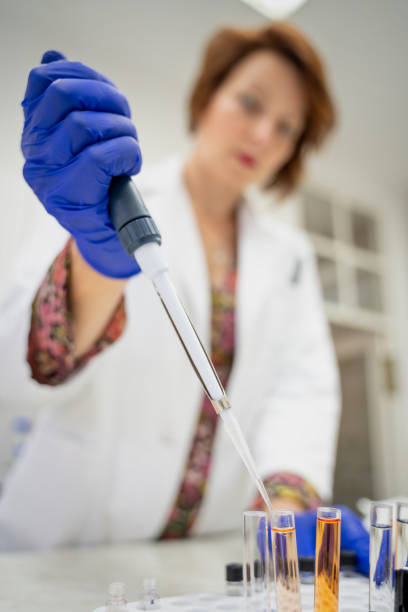 istock a woman who works in a laboratory 1470931204