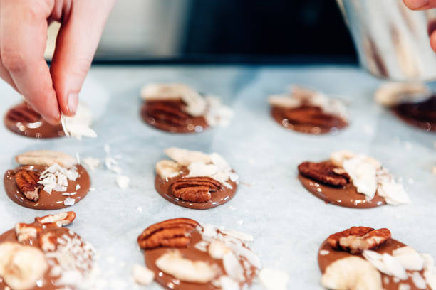 istock topping pastries in an artisan chocolate workshop 1470932115