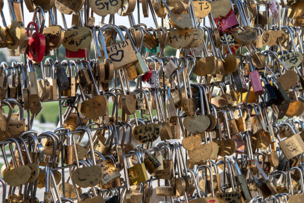 Numerous Colorful Padlocks With Love Declarations Locked On Fence In Paris stock photo