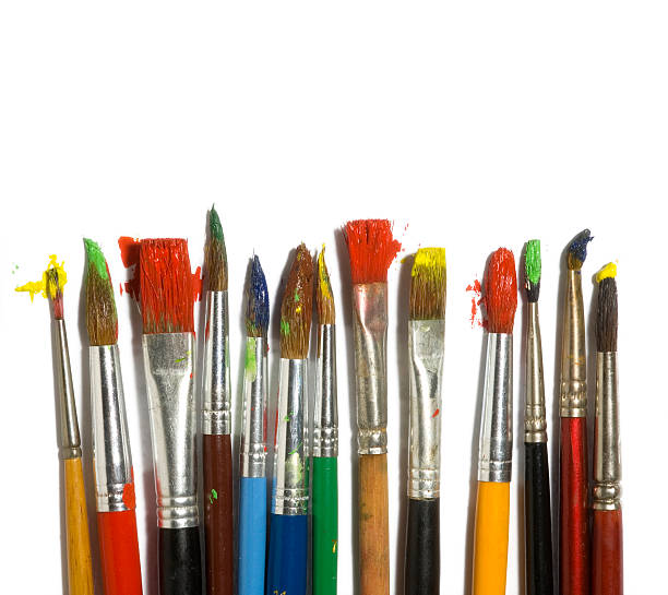 istock paint brushes with color painting 147093312