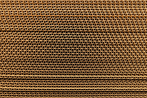 Stacked cardboard sheets, undulated paper, stripped background